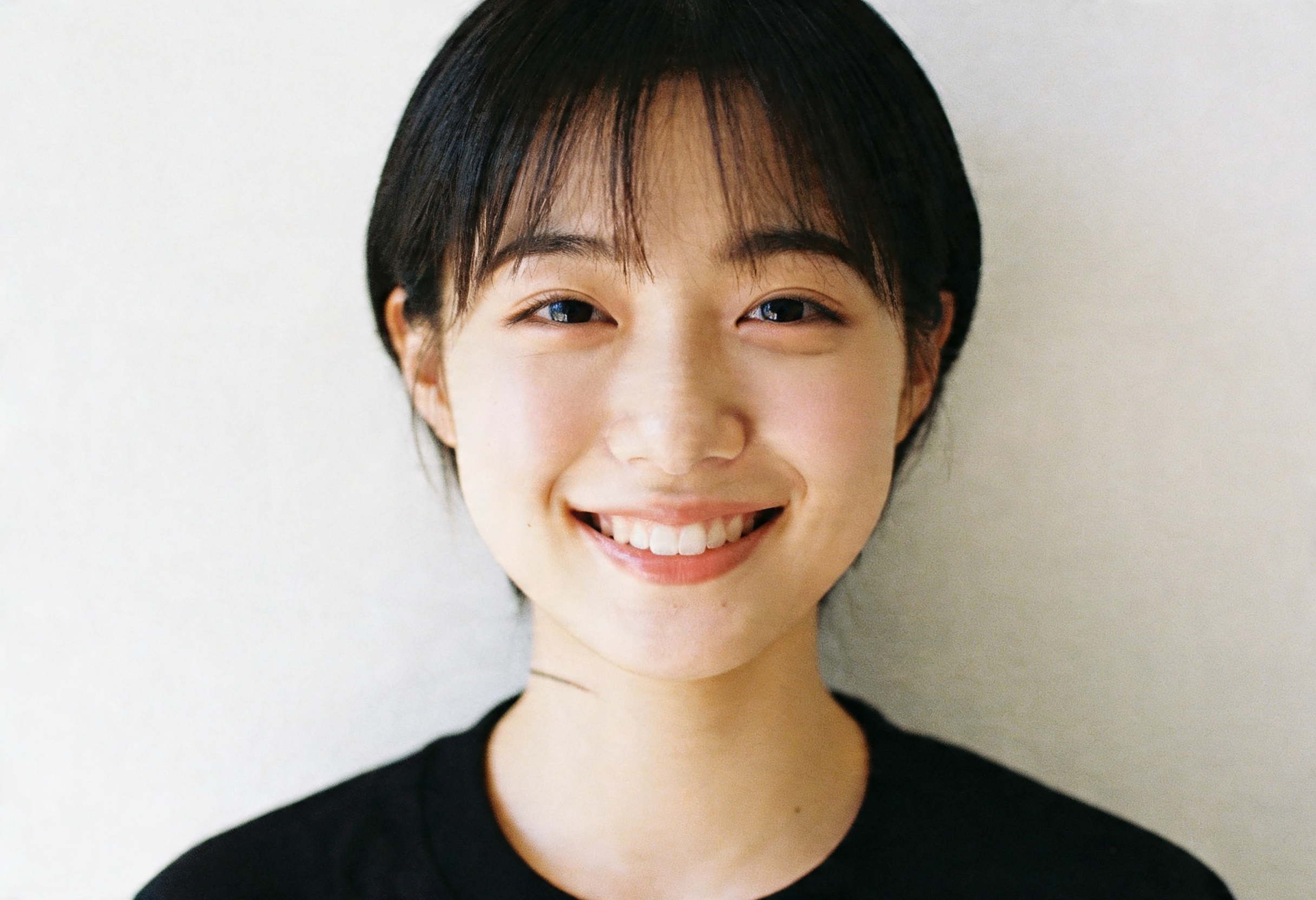 A smiling Redbeanz Medical patient